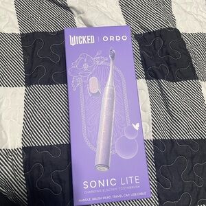Ordo Sonic Lite Electric Toothbrush in Purple Glinda from Wicked